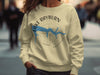 Cream sweatshirt with "Lake Rayburn Arkansas" and a blue lake graphic on a compass.