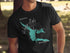 Black t-shirt with teal map of Hebgen Lake, Montana and compass rose.