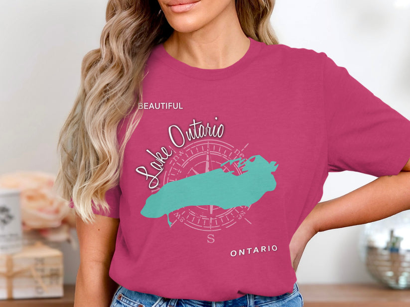 Pink t-shirt with turquoise Lake Ontario map and compass rose design.