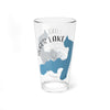 Clear glass tumbler with blue Augur Lake map and compass rose design.