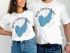 White t-shirts with blue Rose Canyon Lake Arizona graphic and compass design.