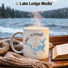White mug with Lake Texoma map and compass design, steaming hot.