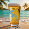 Glass of beer with "NCY PRIEST LAN" and a lake map on a beach.