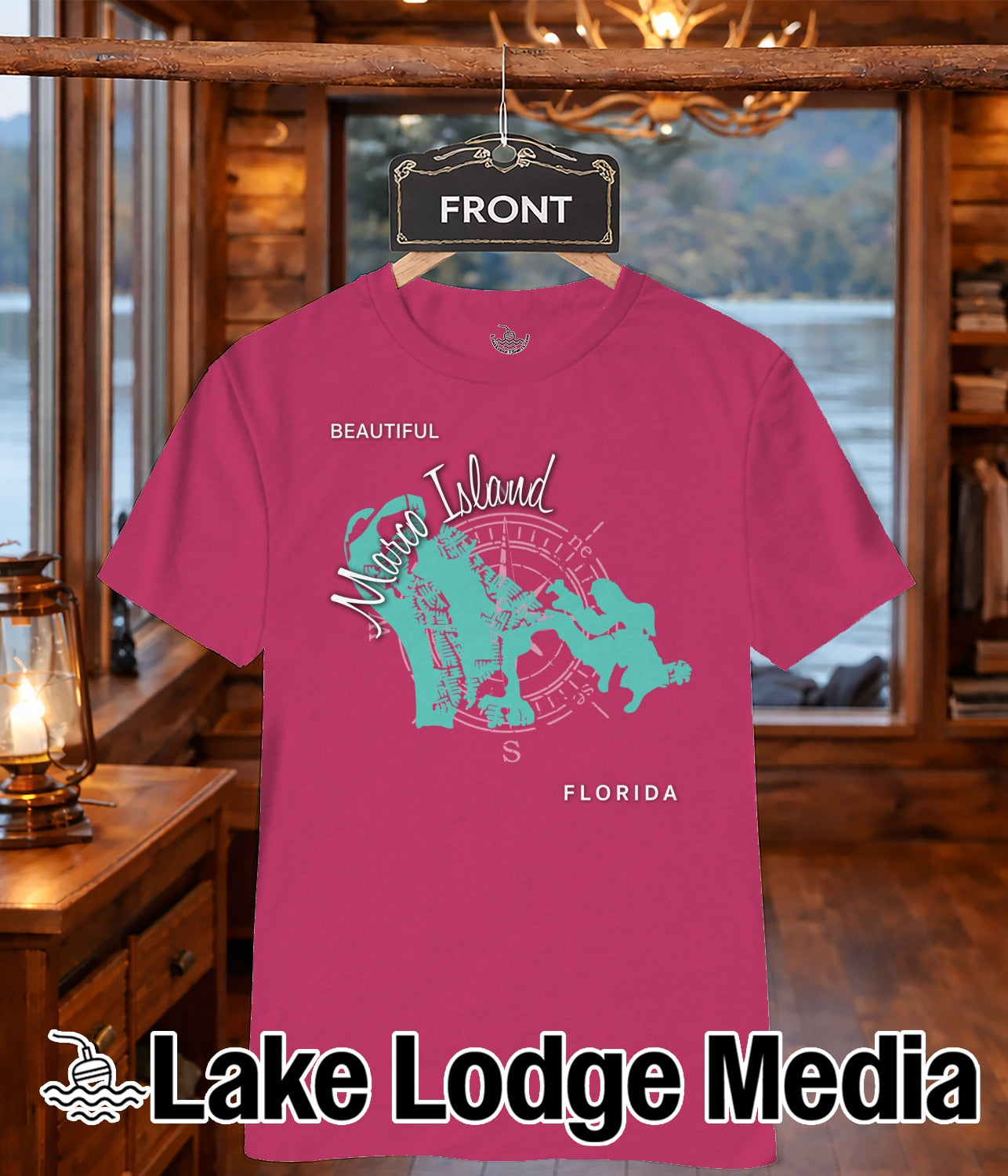 Pink t-shirt with "Marco Island" compass design and "Lake Lodge Media" logo.