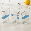 Three clear glasses with "Lake Erie" and blue state outlines above compass designs.