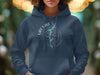 Dark blue hoodie with white text "LAY LAKE" and a compass design featuring lake details and "ALABAMA".
