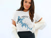 White t-shirt with blue Percy Priest Lake map and compass graphic.