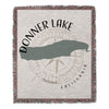 Donner Lake California map with compass rose on a fringed woven blanket.