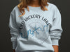 Light blue sweatshirt with "Old Hickory Lake Tennessee" and a compass rose.