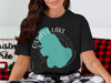 Black t-shirt with a turquoise outline of Ossipee Lake, New Hampshire.