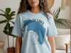 Light blue t-shirt with Garibaldi Lake and British Columbia graphic and compass.