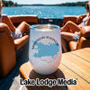 A white tumbler with a Manasquan Reservoir map design sits on a wooden boat table.