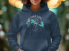 Navy Flagstaff Lake Maine compass graphic hooded sweatshirt.