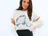 White t-shirt with Lake Mead and compass design, showing Arizona and Nevada.