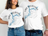 White t-shirts featuring a compass rose with a blue Lake Shelbyville map overlaid.