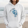 White hoodie with a blue lake graphic and "Lake Tapps Washington" text.