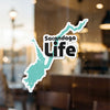 Sacandaga Life sticker featuring a turquoise outline of a lake and black text.
