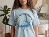 Light blue t-shirt with Lake Thunderbird Oklahoma map and compass graphic.