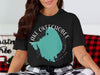 Black t-shirt with cyan Lake Okeechobee map graphic and "FLORIDA" text.