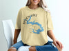 Yellow t-shirt with Spoon Lake Illinois map graphic and compass rose.