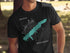 Black t-shirt featuring a teal outline of Sardis Lake, Mississippi, with a compass rose.