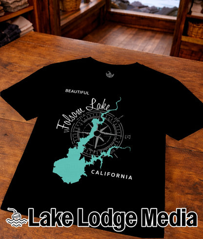 Black t-shirt with Folsom Lake map and compass graphic, "Lake Lodge Media" text.