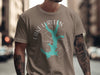 Lake Lurleen t-shirt with turquoise map and compass graphic on tan shirt