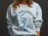 Light blue sweatshirt with Lake Fort Gibson Oklahoma map and compass graphic.