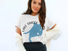 White t-shirt with blue Lake Simcoe map graphic and "ONTARIO" text.