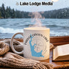 White mug with Parker Canyon Lake Arizona design on a windowsill.