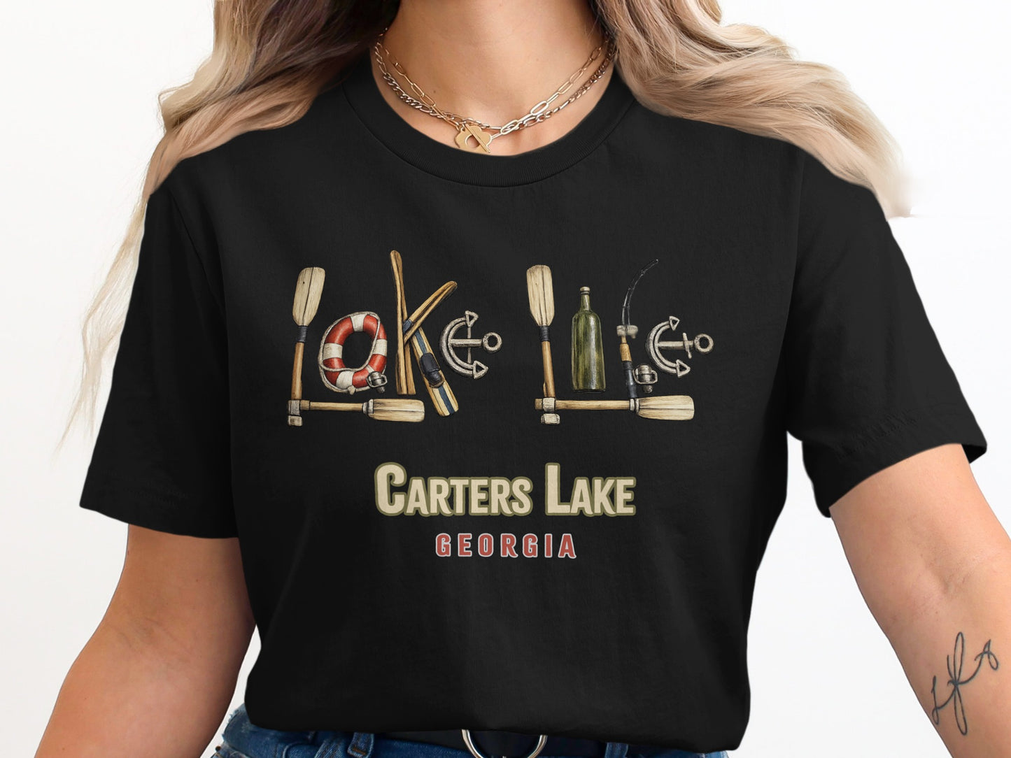 Black t-shirt featuring "CARTERS LAKE GEORGIA" and lake-themed illustrations.