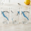 Three clear glasses with blue Lake San Pablo map and compass design.