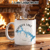 White mug with "Skiatook Lake Oklahoma" and a compass design.