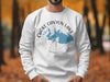 White sweatshirt with Choke Canyon Lake, Texas map, and compass design