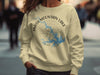 Light yellow sweatshirt with Smith Mountain Lake Virginia map and compass design