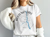 White t-shirt with Kootenay Lake Canada compass graphic and blue lake illustration.
