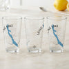 Three clear glasses featuring a blue map of Long Lake, Maine, and a compass rose.