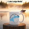 White mug with "Merrymeeting Lake New Hampshire" design on a lake background.