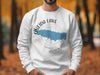 White sweatshirt with Oneida Lake map and compass graphic, New York.