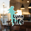 Turquoise lynx shape sticker with black text reading "Lynx Life".