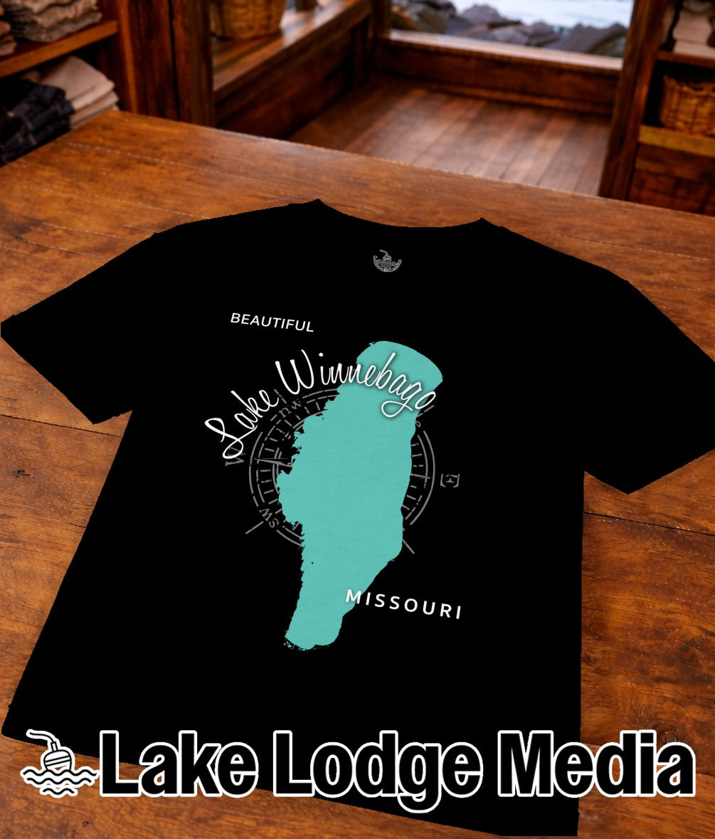 Black t-shirt with turquoise Lake Winnebago outline and "Lake Lodge Media" logo.