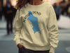 Light yellow crewneck sweatshirt with Jordan Pond map and compass graphic.