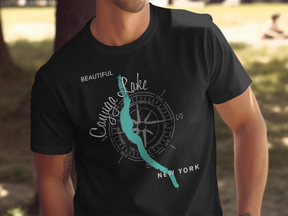 Black t-shirt with "Beautiful Cayuga Lake New York" and compass graphic.