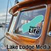 "Convict Life" sticker on a boat window with "Lake Lodge Media" logo.