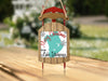 Sled ornament with "Merry Christmas From Lake Istokpoga" text.