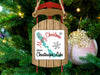 Sled ornament with "Merry Christmas From Chautauqua Lake" text and lake shape.