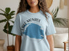 Light blue t-shirt with "Lake Monroe Florida" graphic and compass rose.