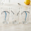 Three glasses with "Lake Windermere England" and a compass design.