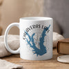 White mug with Calaveras Lake Texas map design and compass rose.