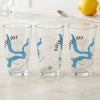 Three clear glasses with blue Kaw Lake Oklahoma map and compass designs.